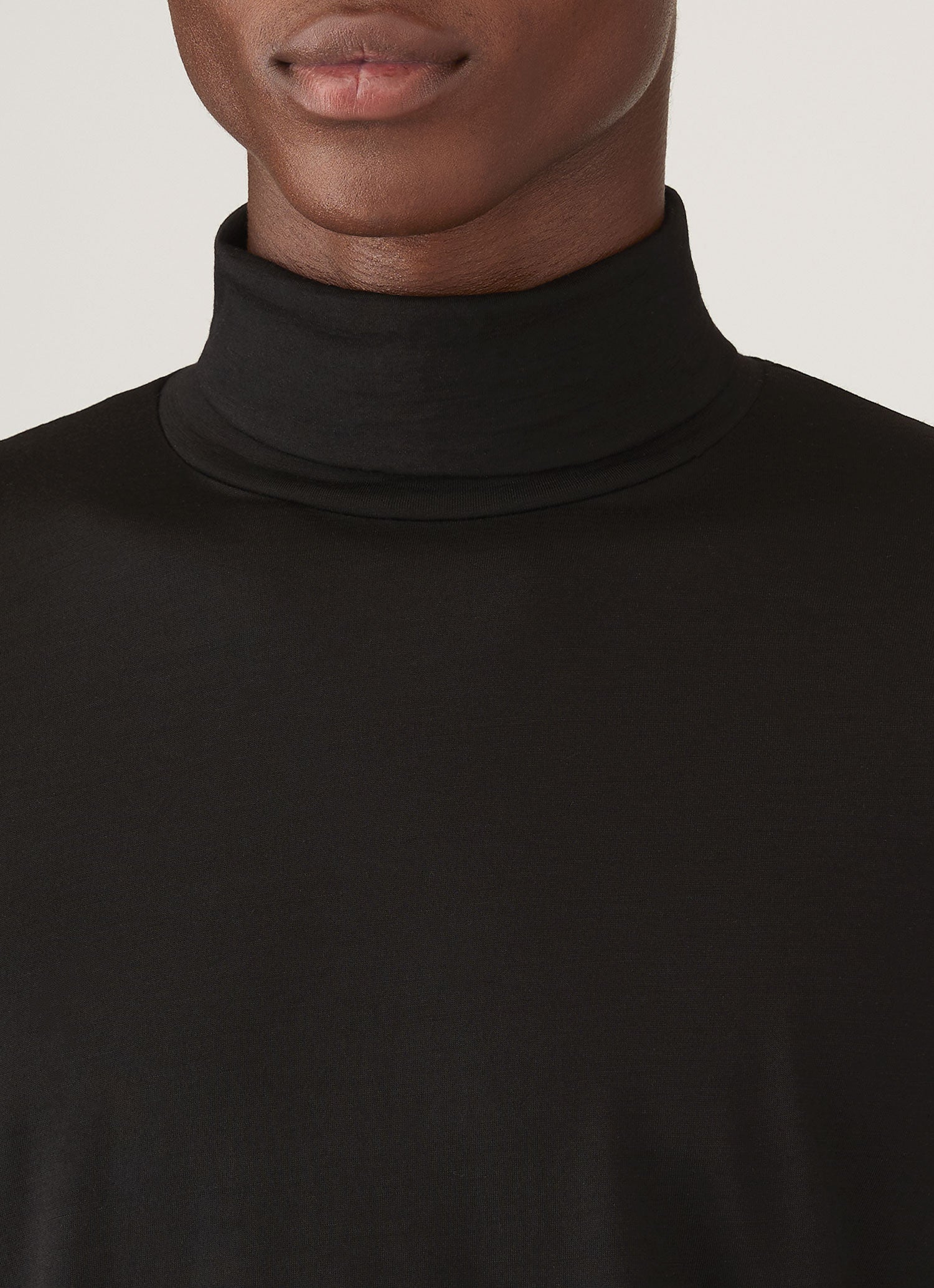 Men's Ultra-Fine Merino Roll Neck in Black
