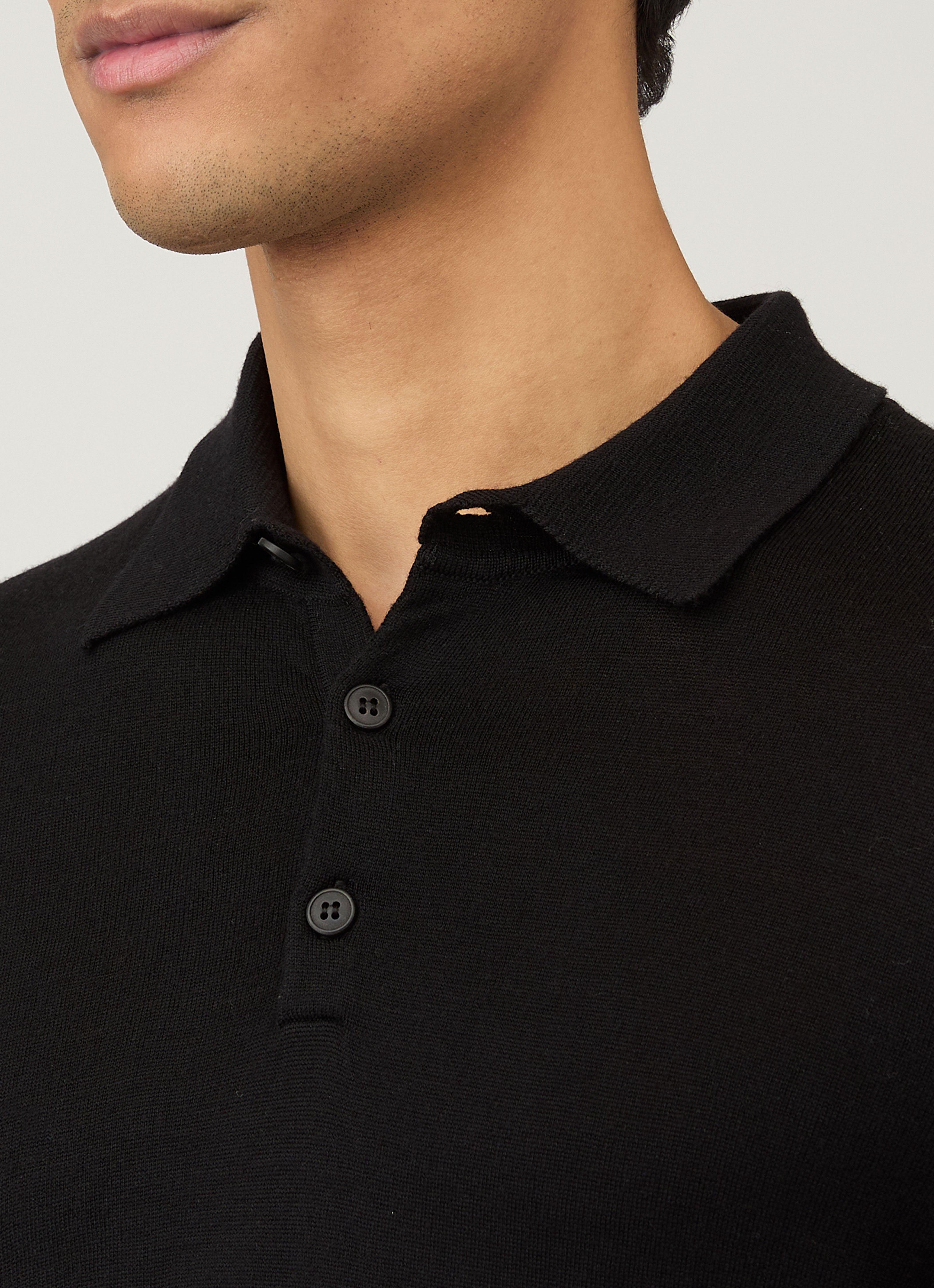 Men's Extra-Fine Merino Knitted Polo Shirt in Black | Sunspel
